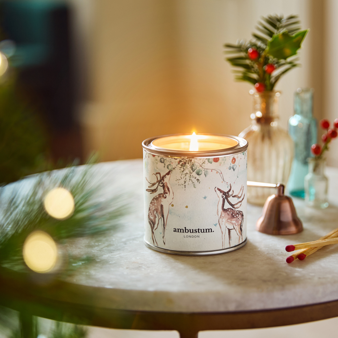 An ambustum Noel candle tin. A classic Christmas scent, Noël is sure to bring an instant festive feel. Enjoy the inviting aroma of orange with notes of cinnamon, nutmeg and comforting vanilla.