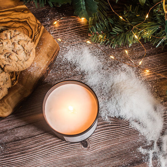 A vegan and cruelty free ambustum christmas tree candle with fragrance notes of  rich Herbal fragrance dominated by Siberian Pine alongside Eucalyptus & Precious Woods.